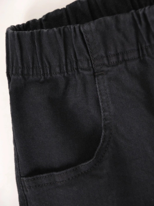 Czarne eleganckie dzwony damskie z gumką w pasie – wysmuklające nogi, idealne dla sylwetki plus size 36894