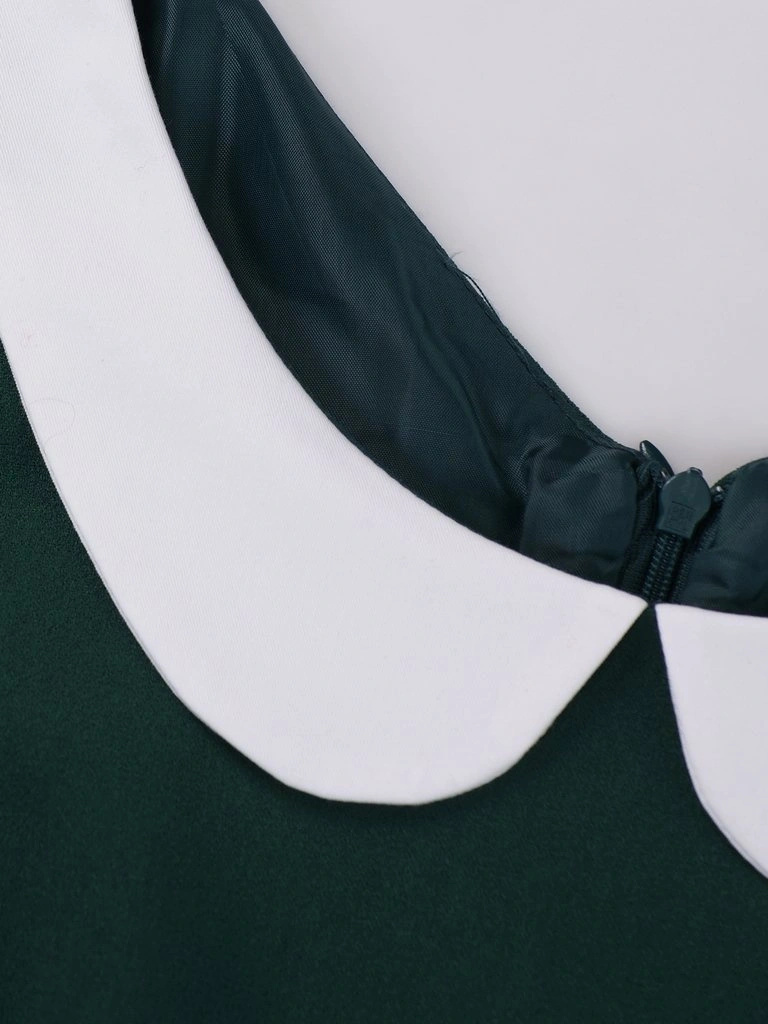 Elegancka zielona sukienka rozkloszowana midi z kołnierzykiem – fason modelujący talię z rękawem 3/4 14729
