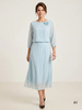 Elegancka sukienka rozkloszowana maxi w odcieniu mięty – wysmuklający dekolt w łódkę i rękaw 3/4 41695