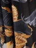 Elegancka czarna sukienka rozkloszowana maxi w jesienne liście – kobiecy krój wysmuklający sylwetkę 37086