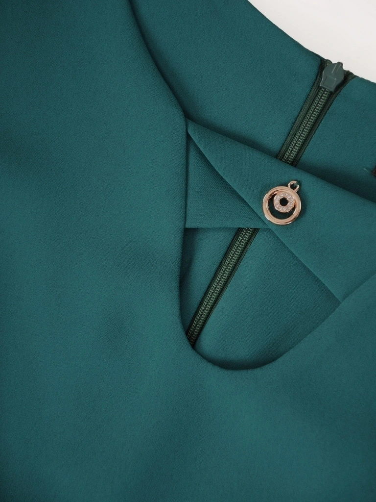 Elegancka butelkowa sukienka trapezowa midi – tuszujący biodra krój idealny na jesień 38586