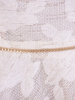 Sukienka ozdobiona łańcuszkiem Kalina II, modna kreacja z biżuteryjną wstawką.