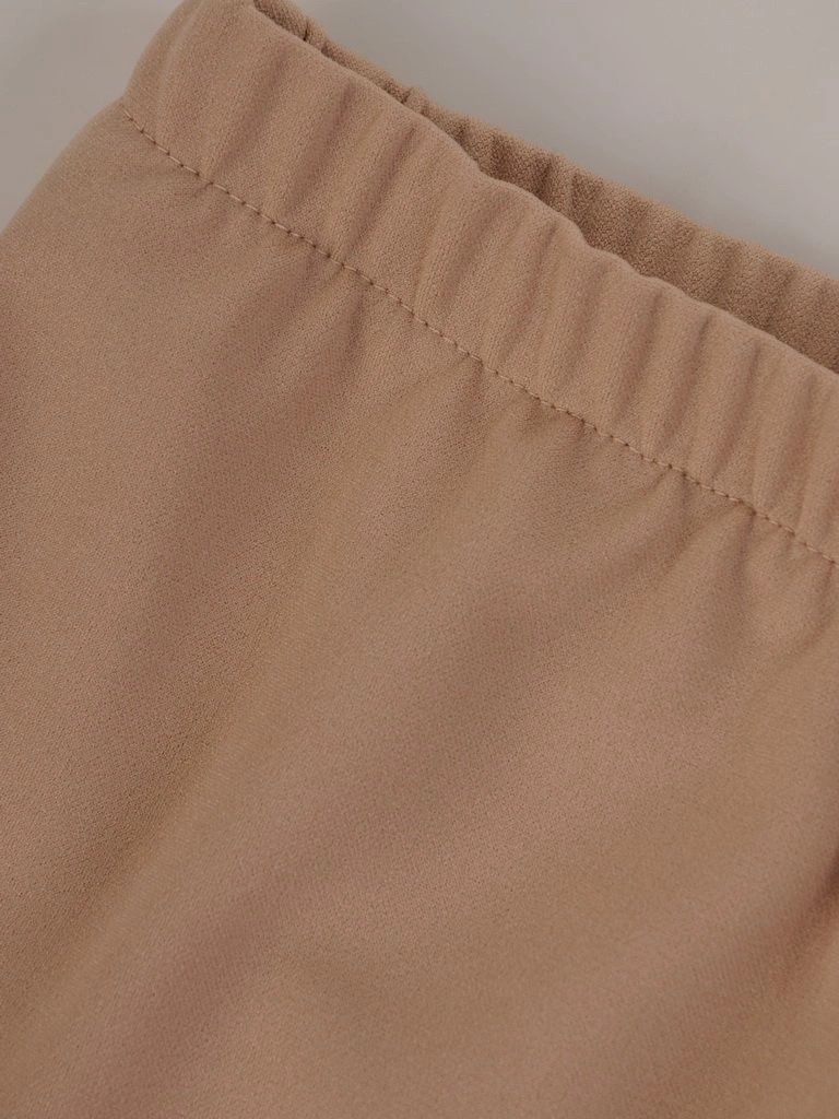 Eleganckie dopasowane spodnie damskie w beżu – elastyczna talia na gumce modelująca figurę 25850