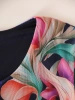 Elegancka sukienka trapezowa midi w kwiaty – wygodny krój z falbanami tuszujący biodra 38364