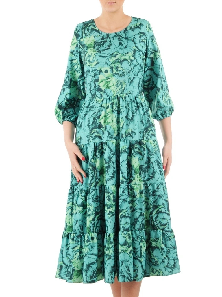 Elegancka zielona sukienka rozkloszowana w kwiaty – kobiecy fason midi na jesień 35490