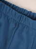Spodnie damskie z przeszyciami i gumą w pasie 27334