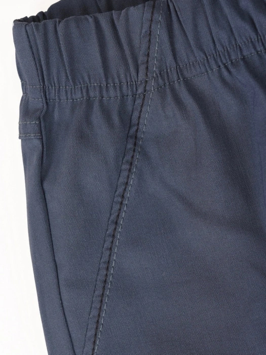 Eleganckie niebieskie spodnie damskie na gumce – dopasowany fason ze stylowymi suwakami 34875