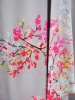 Elegancka sukienka na wesele maxi w kwiaty – rozkloszowany fason z kopertowym dekoltem 35877