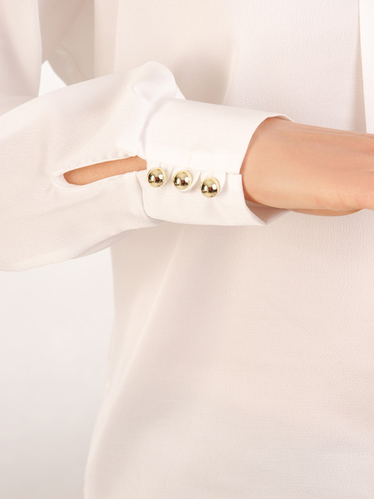 Elegancka bluzka z ozdobną kokardą na dekolcie 31664