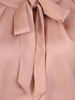 Elegancka bluzka z ozdobną kokardą na dekolcie 31665